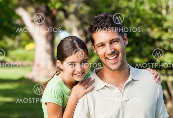 Daughter with her father in the park