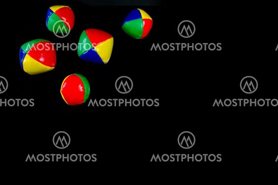 juggling balls set of views from up on a black background