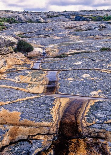 Rocky landscape with a creek on the bedrock