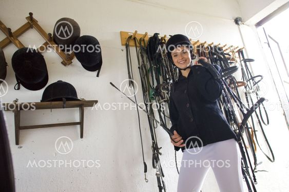 equestrian in a stable