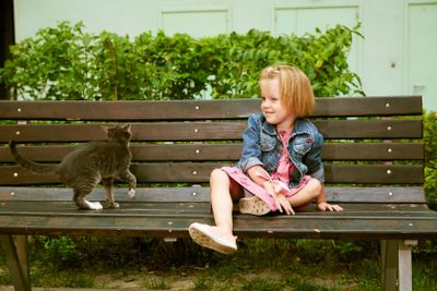 Portrait of funny little child, adorable blonde toddler...