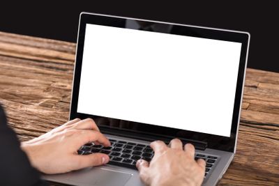 Businessperson Working On Laptop