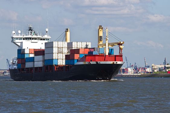 Containership on the river leaving port