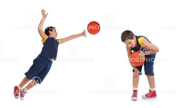 Boy playing basketball isolated