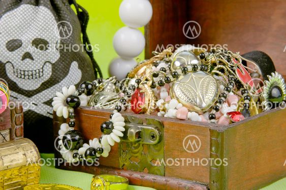 small box with treasures on a light green background