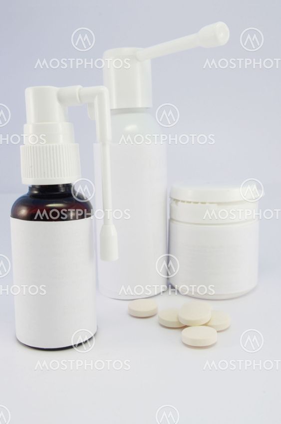 Bottle of Medicine with pills and spray for nose