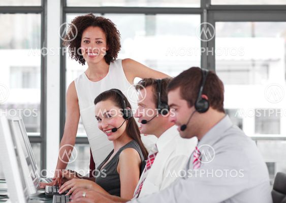 Self-assured female manager with her sale representative team