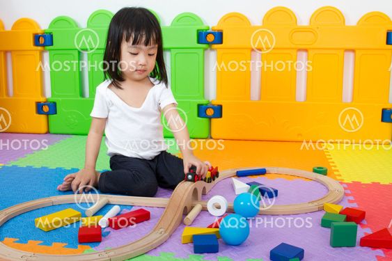 Asian Chinese children playing with blocks