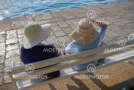 Two ladies with nice hats