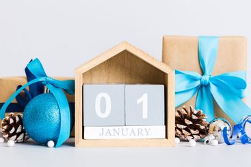 1 january. Christmas composition on colored background...