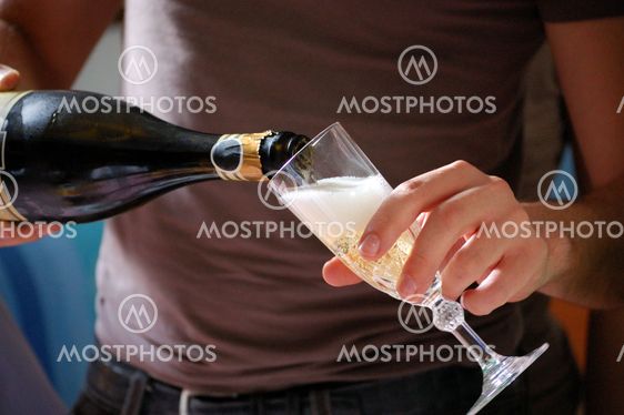 serving champagne