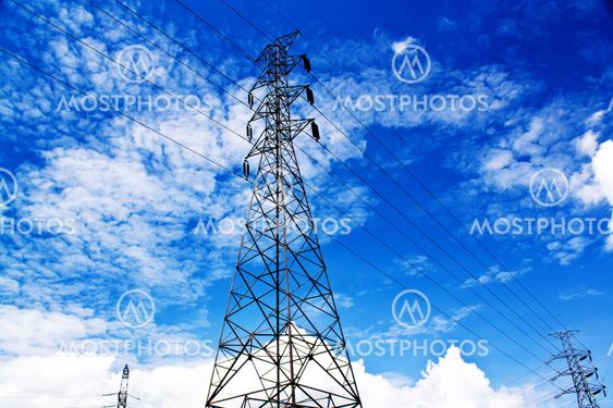 high voltage post.High-voltage tower blue sky background.