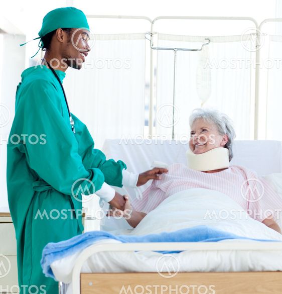 A surgeon caring for a patient
