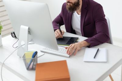 People and technology concept - High angle view of an...