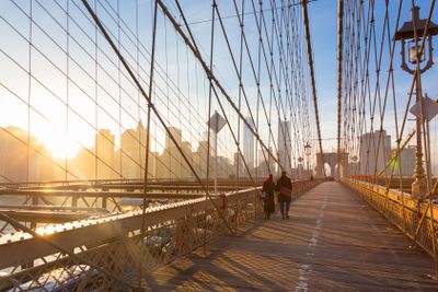 Brooklyn bridge at sunset, New York City.