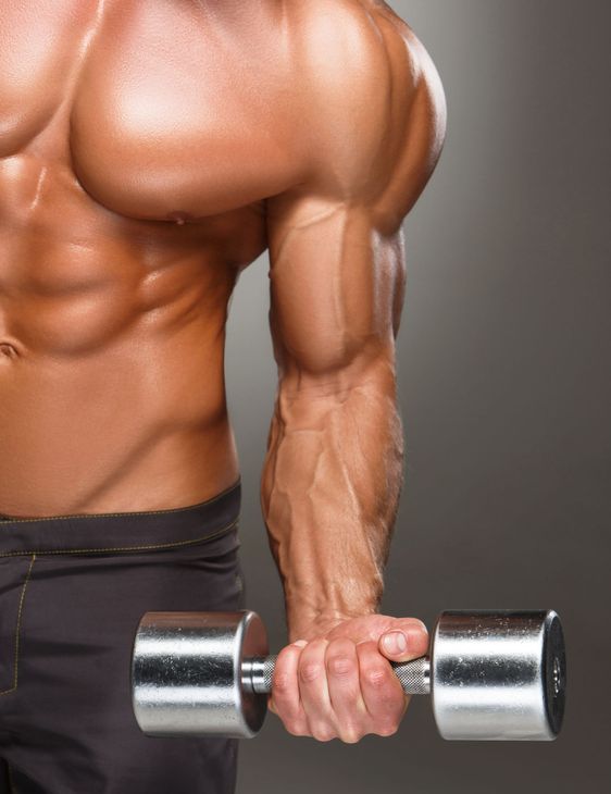Closeup of a handsome power athletic man bodybuilder...