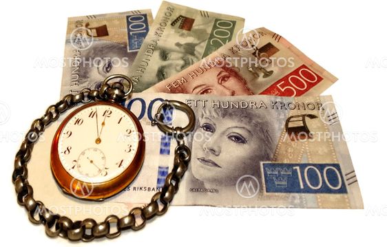 Swedish money bills with clock almost twelve.