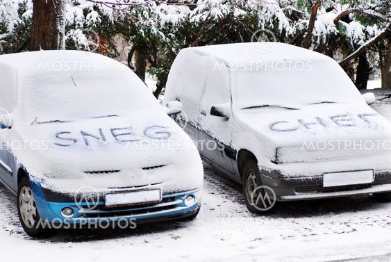Snow letters written on cars