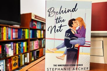 Romantic book display in a cozy bookstore with colorful...