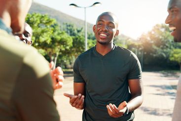 Fitness, talking and men with routine, outdoor and...