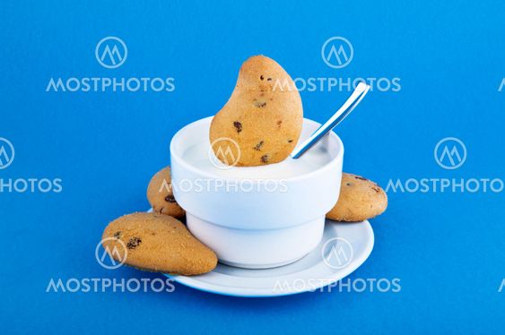 Cup of milk and biscuits