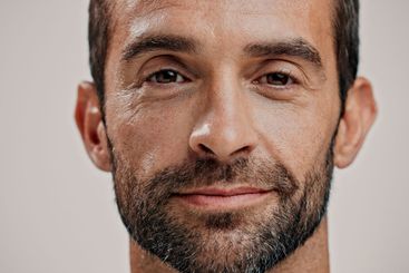 Portrait, skincare and man with natural beauty, beard...