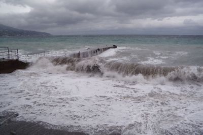 View of storm seascape. Dark moody sky over the gray...