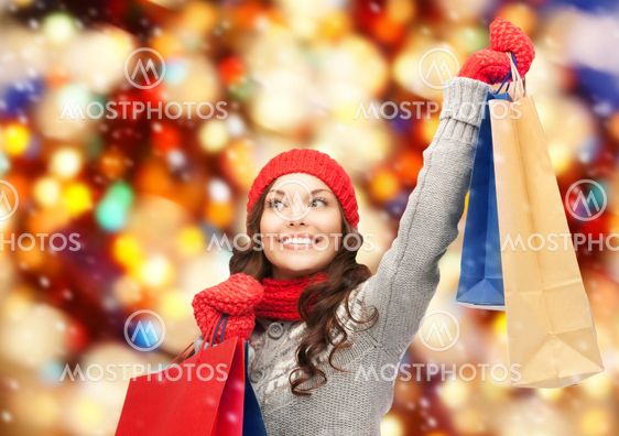 asian woman in winter clothes with shopping bags