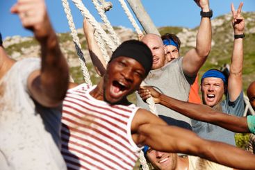 Bootcamp, group and celebration for climbing rope at...