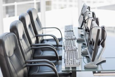 Chairs, computers and headset in a modern office