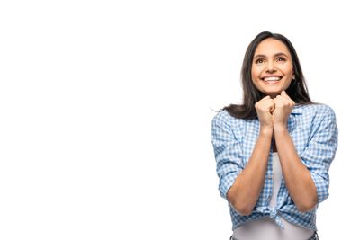 smiling girl with clenched fists Isolated On White with...