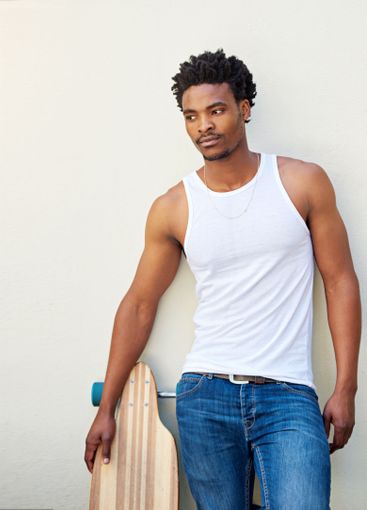 Thinking, trendy and man with skateboard, wall and guy...