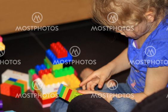 Child playing lego