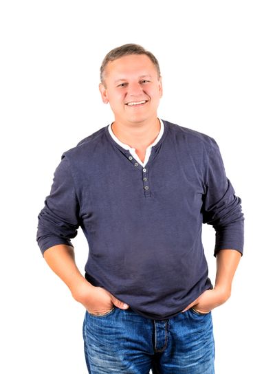 Casually dressed middle aged man in blue