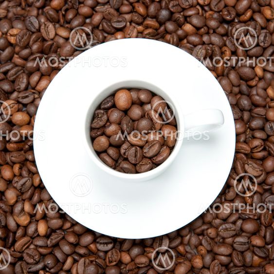 background with white cup and coffee beans