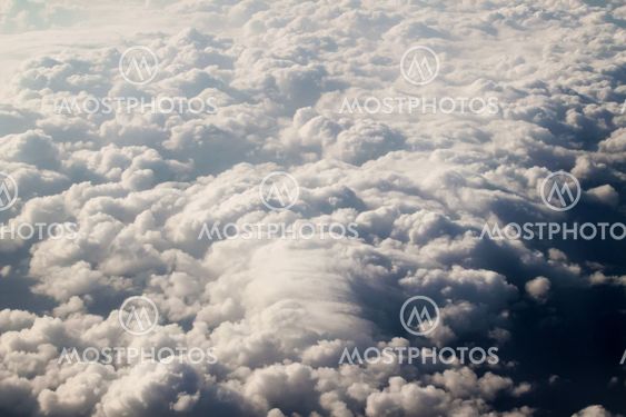 dramatic blue sky with clouds and sun rays
