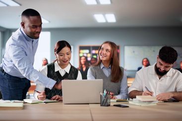 People Studying Knowledge In Classroom Indoors