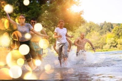 summer joy friends having fun on river