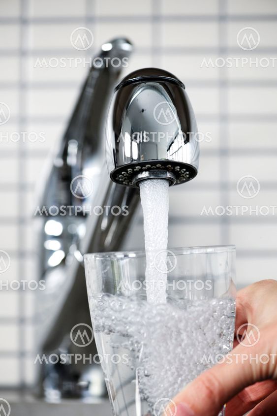 Filling glass of tap water