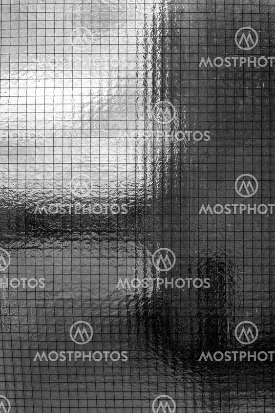 Closeup of window with squares as background