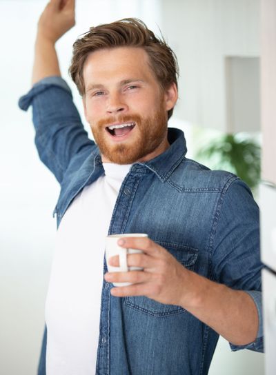 a monday morning man drinking coffee