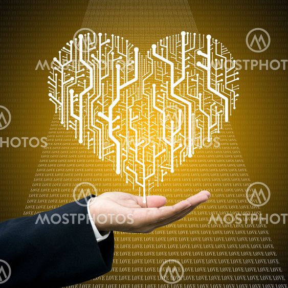 Businessman care the circuit board in heart shape
