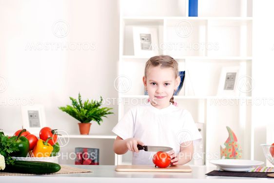 girl cooking vegetables