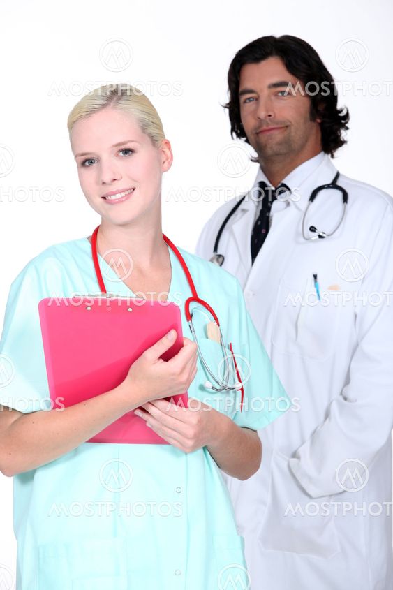 young doctor and nurse posing together