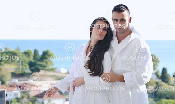 couple relaxing on balcony