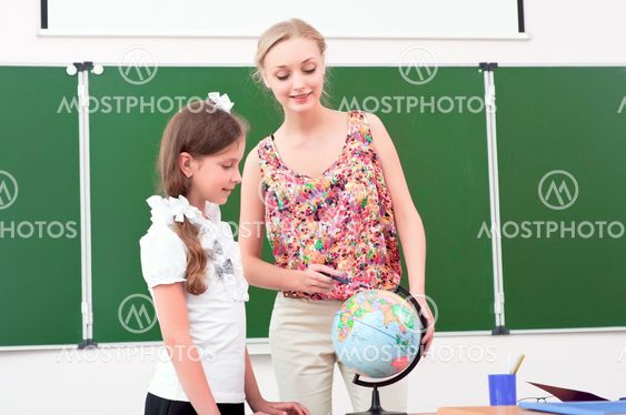 teacher explains the lesson in geography