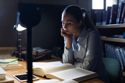 Woman studying late at night