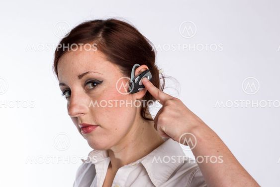 Woman with Bluetooth Headset