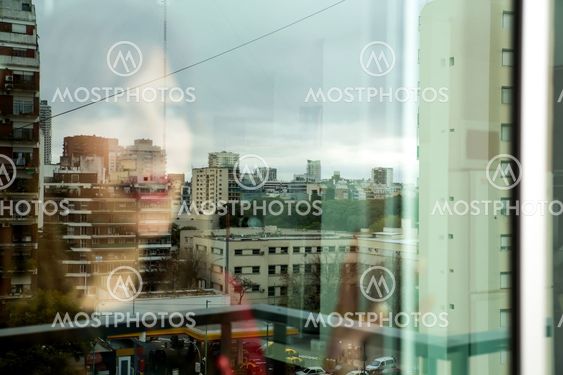 Mature woman looking out the window