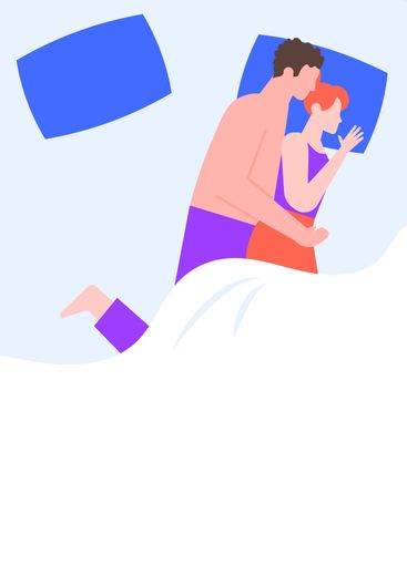 Young romantic couple cuddling in bed, peacefully...